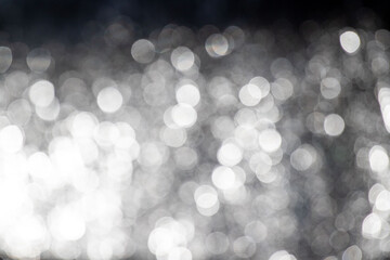 Wall Mural - the image is a blurry, white background with many small