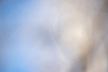 Wall Mural - a blurry blue sky with a white cloud