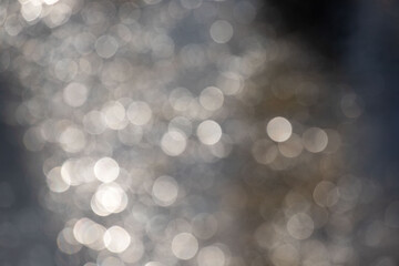 Wall Mural - the image is a blurry photo of water with many small circles