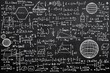 © peshkova - Mathematical equations and geometric shapes on a chalkboard.
