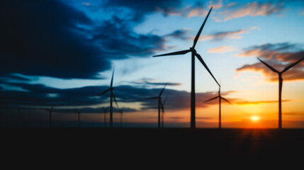Poster - Wind Turbines at Sunset: A silhouette of wind turbines against a vibrant sunset, symbolizing renewable energy and a sustainable future.