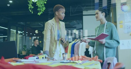 Aufkleber - Two women discussing fashion designs in modern office with data animation overlay