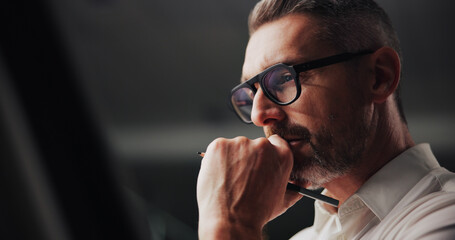 Poster - Thinking, mature and businessman in office for thoughts, planning and professional with glasses. Night, male person and architect with drawing career for solution, contemplation and startup deadline