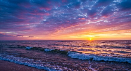 Poster - The ocean is calm and the sky is a beautiful shade of pink