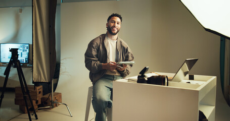 Poster - Studio, photographer and portrait of man with tablet for editing software, photoshoot and production. Happy, creative director and person with digital tech for media catalogue, photography and film
