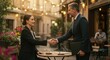 © Oxana39 - Business meeting in outdoor café with caucasian female and male professionals shaking hands