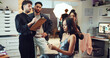© peopleimages.com - Clipboard, phone or photography with makeup artist and model in studio for behind the scenes preparation. Communication, planning and schedule with woman on set for catalog or magazine photoshoot