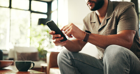 Leinwandbilder - Hands, relax and phone with man on sofa in lounge for networking app, social media post and chat. Connection, download and update with person in living room of home for reading, scroll and mobile