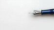 © julio - Close Up Of Blue Fountain Pen Nib On White Surface