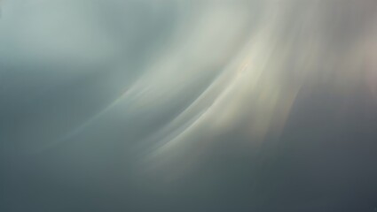 Poster - Cloud formations during twilight create a serene atmosphere against a backdrop of muted colors in the open sky