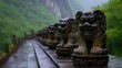 © SATRIANANGISAN - Stone guardian figures on a wet walkway