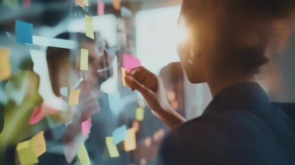 Aufkleber - A medium closeup of a holographic brainstorming board featuring colorful sticky notes and concept maps. A group of professionals gathers around animatedly discussing ideas with expressions