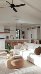 Poster - Bright afternoon light bathes the airy living area, highlighting the soft textures of pillows and a stylish plant. Minimalist furnishings create a warm, inviting atmosphere in this serene home