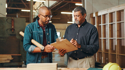 Aufkleber - Carpentry, meeting and men in workshop with clipboard for furniture, restoration and lumber manufacturing. Construction, factory and carpenters planning with planks, timber and board for renovation