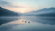© Dawood - A pristine lake at dawn, surrounded by misty mountains.