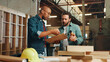 © peopleimages.com - Clipboard, teamwork or people in carpentry warehouse factory for inventory, plan or furniture production. Woodworking, carpenter or project progress update for timber, lumber or construction business
