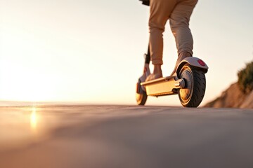 Poster - solo rider enjoying sunset ride on rented electric scooter along coastal pathway golden light and clear skies enhancing