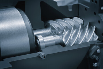 Aufkleber - A close up of a machine with a lot of metal parts. The machine is made of metal and has a lot of screws and bolts