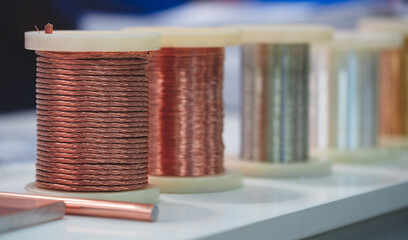 Poster - A bunch of different colored wires are displayed on a table. The wires are of different colors and lengths