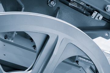 Aufkleber - A close up of a wheel with a silver color. The wheel is in the middle of the image and is surrounded by a gray background