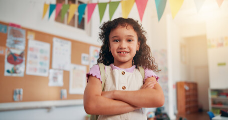 Poster - Arms crossed, smile and education with girl in classroom for learning, future and youth. Scholarship, academy and growth with portrait of student in school for child development, knowledge and lesson