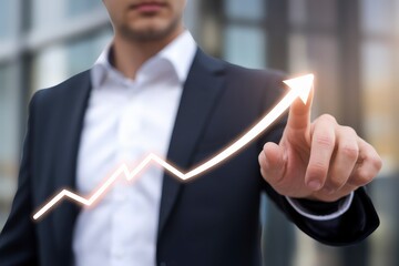 Poster - A businessman pointing at a glowing upward trend graph, symbolizing success and growth.