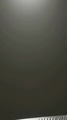 Poster - Abstract light movement over textured metallic surface in minimalist setting
