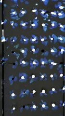 Poster - Kaleidoscopic light patterns shifting across led panels in dynamic sequence