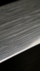 Poster - Closeup of brushed metal surface with changing light reflection and texture detail