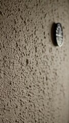 Poster - Textured wall surface with circular object: light and shadow interaction sequence