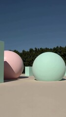 Poster - Geometric spheres in motion under blue sky with trees in background