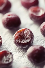 Poster - A close-up view of a few plums arranged on a table, perfect for a still life or food-related context