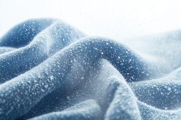 Poster - A close-up shot of a blanket covered in fresh snow, perfect for winter-themed designs or cold-weather scenes