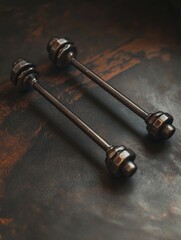 Poster - A pair of metal handles sitting on a table, ideal for use in interior design or product photography