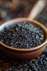 Poster - A steaming bowl of black tea sits on a table, perfect for a cozy moment