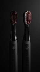 Poster - Close-up of two electric toothbrushes placed together on a surface