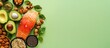 © singgih - Healthy Foods Arrangement Salmon Avocado and Nuts on Green Background