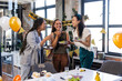 © Wavebreak Media - Female diverse colleagues celebrating birthday at office, enjoying cake and laughing together
