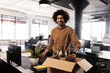 © Wavebreak Media - Smiling man unpacking box in modern office, starting new job with enthusiasm