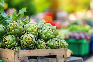 Poster - Fresh bunch of artichokes in wooden crate displaying healthy produce and natural food choices in rustic setting