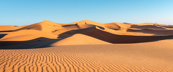 Poster - Orange sand dunes under a clear blue sky, showcasing a vast and arid landscape, representing freedom, adventure, and the beauty of nature