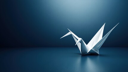 Poster - A white paper crane stands alone on a dark surface