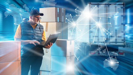 Poster - Man logistician. Logistics specialist among boxes. Transport dispatcher stands next to departing truck. Man logistician is using laptop. Truck business owner near world map. Global logistics