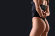 © Pixel-Shot - Pretty young woman in underwear on black background
