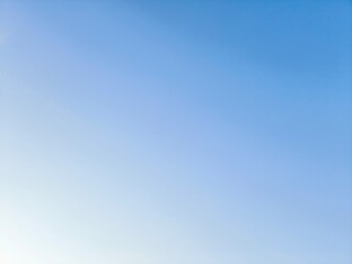 blue gradient background. background is a soft blue gradient. blue sky background.