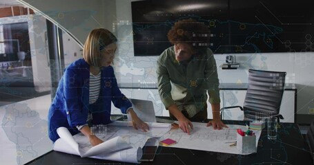 Poster - Reviewing architectural plans with digital data overlay, colleagues in modern office