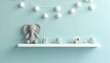 © Irina - Cute gray elephant toy on a light blue shelf with decorative items and soft lighting