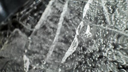 Poster - Close up shot of an ice surface with cracks and frozen air bubbles
