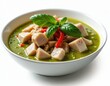 © Vadym - Thai green curry with sliced pork in white bowl. Gang Kiew Wan with meat, vegetables on isolated white background. Delicious meal, tasty dish from asian cuisine.