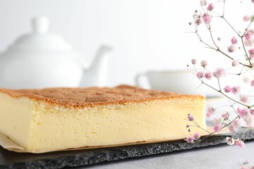 Wall Mural - tasty japanese castella sponge cake served on light table, closeup